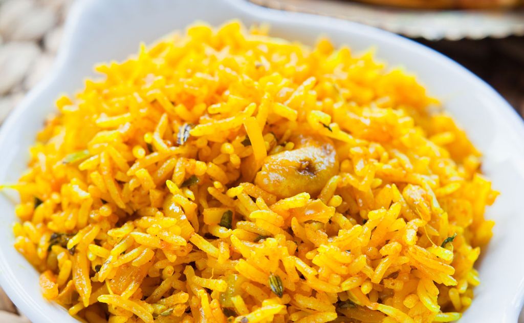 Arroz a la cúrcuma con limón, cominos y almendras