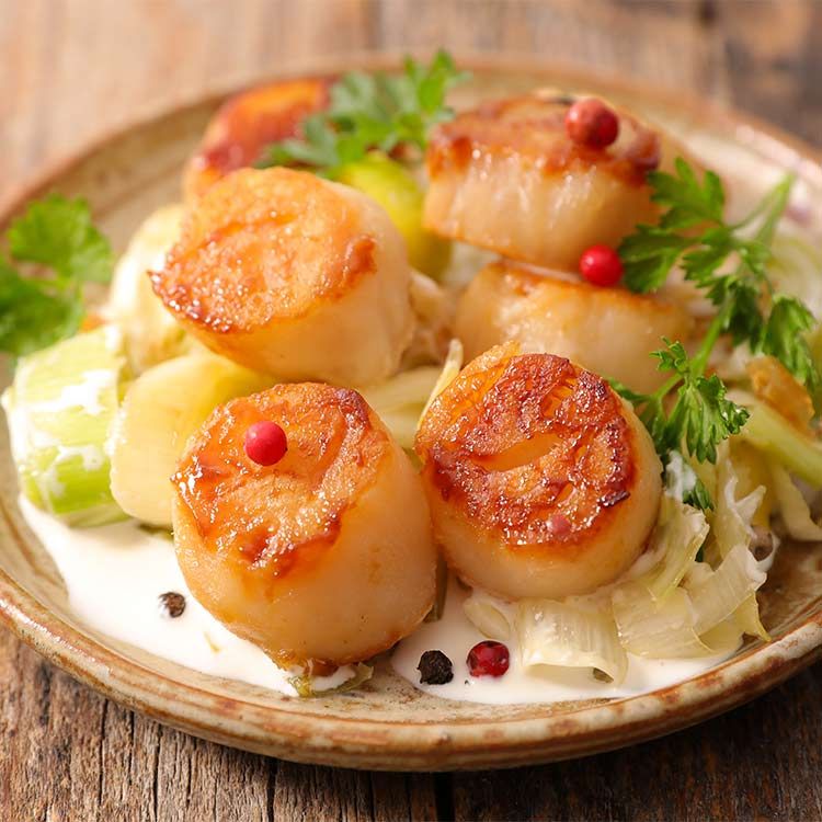 Ensalada de vieiras y puerros confitados Ensalada de vieiras y puerros confitados