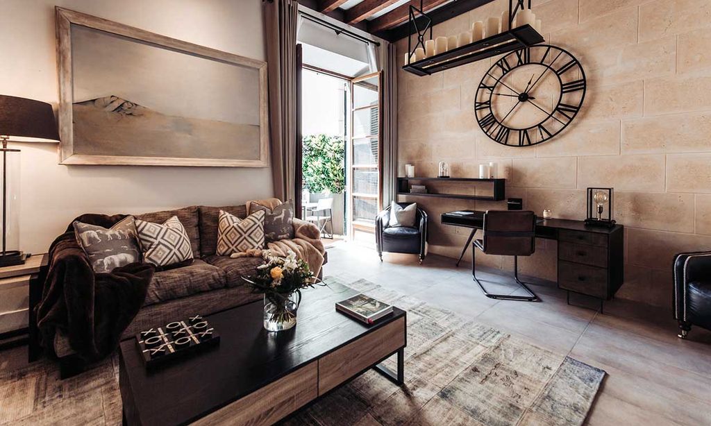 Un apartamento que actualiza el estilo industrial para que luzca moderno y elegante