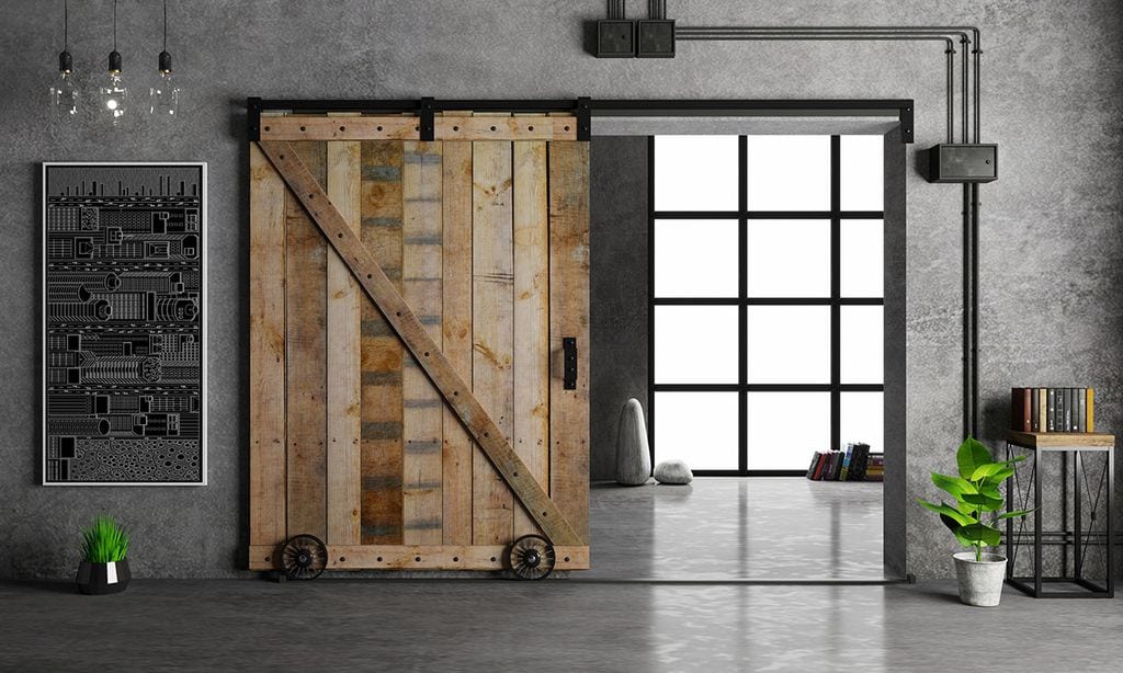 Cómo construir una puerta corredera de 'estilo granero' con madera y metal