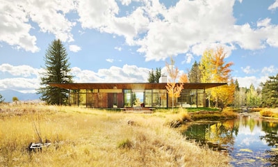 Un proyecto que evoluciona con el tiempo: de casa de madera a pabellón de acero y vidrio
