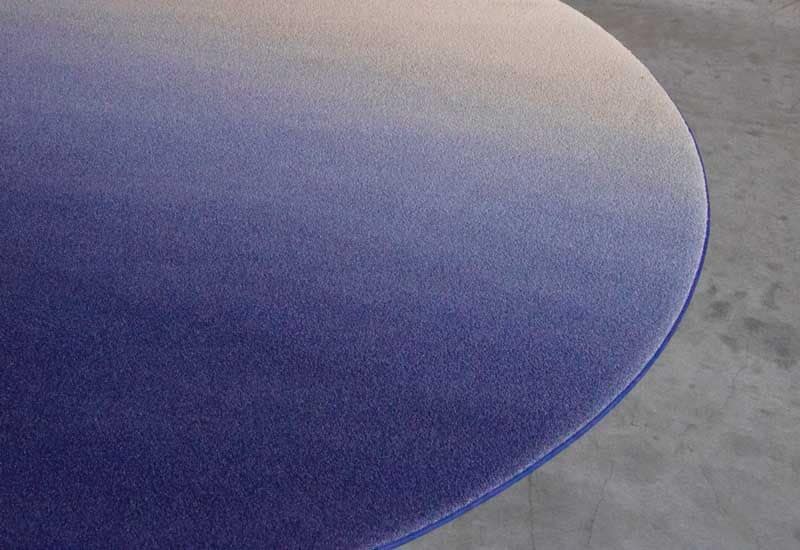 Alfombra redonda de color morado