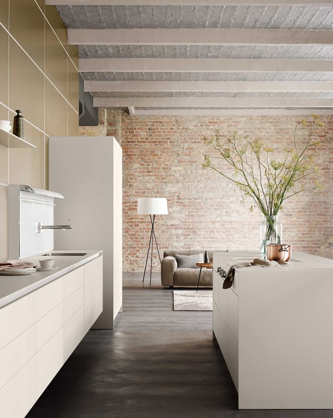 Cocina con isla y, abierta a la zona de salón