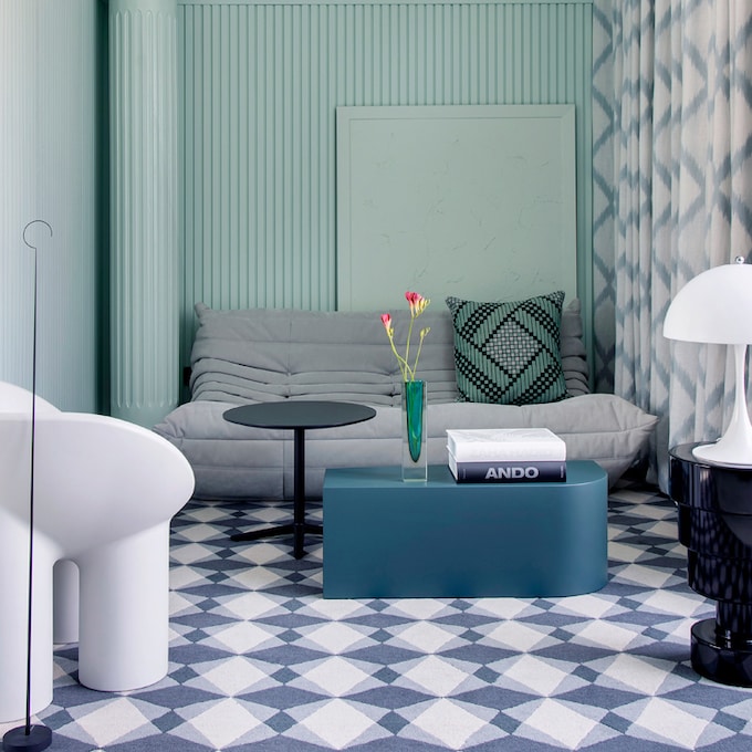 Un elegante piso en Valencia repleto de muebles y luminarias iconos del diseño