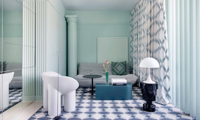 Un elegante piso en Valencia repleto de muebles y luminarias iconos del diseño