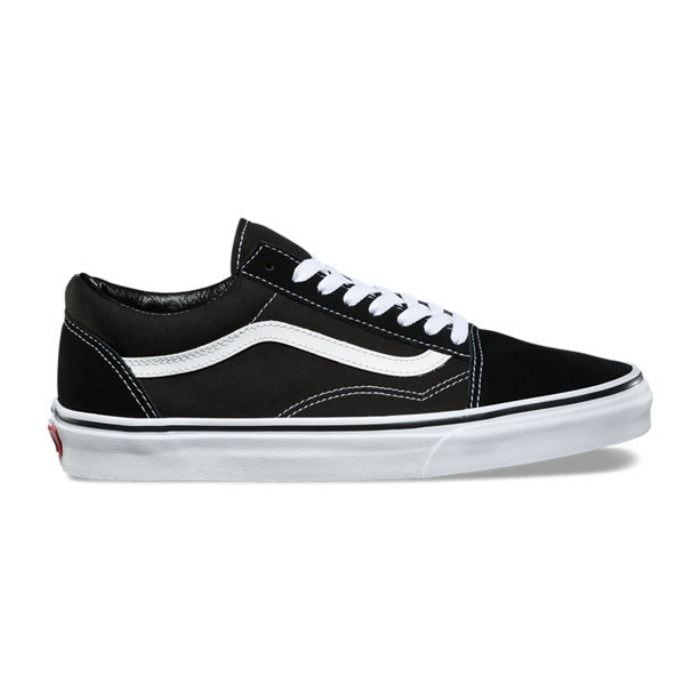 vans negras linea blanca