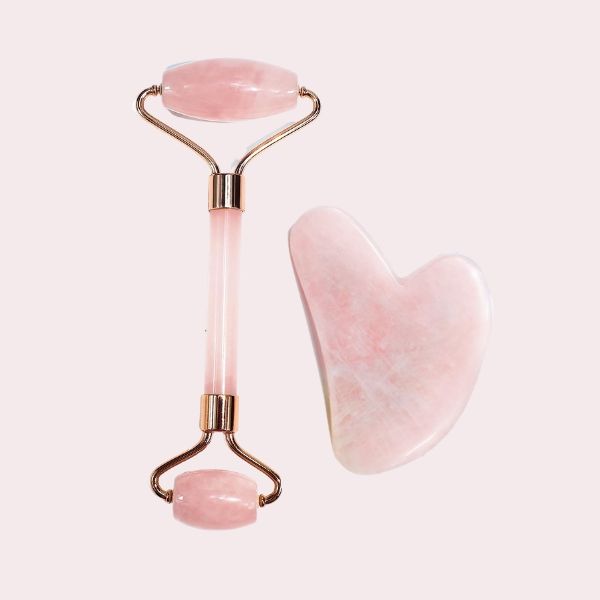 Rodillo facial y piedra gua sha de cuarzo rosa