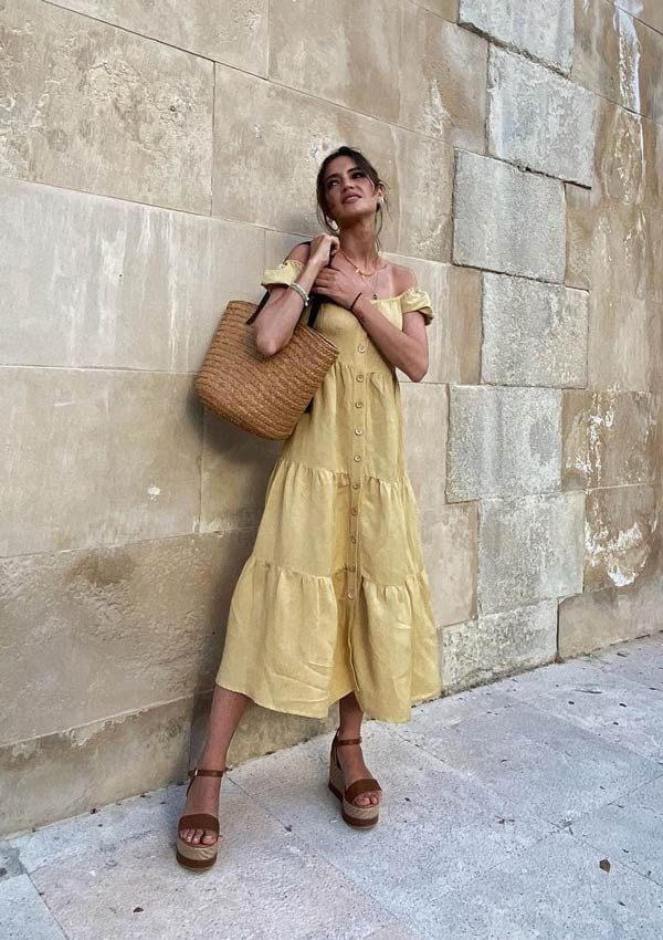 Sara Carbonero con vestido amarillo de Slowlove