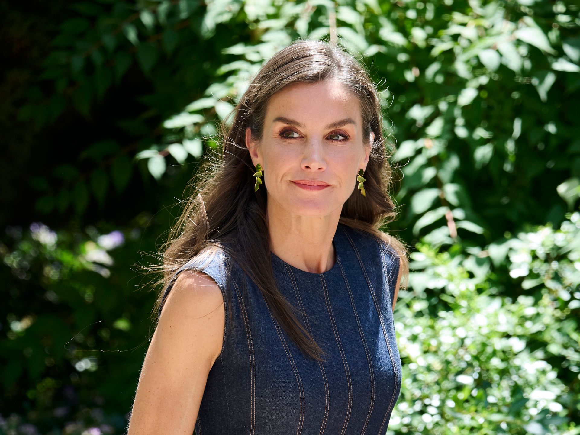 princess polly baby blue dress Queen Letizia rocks denim dress and bold red heels in Barcelona