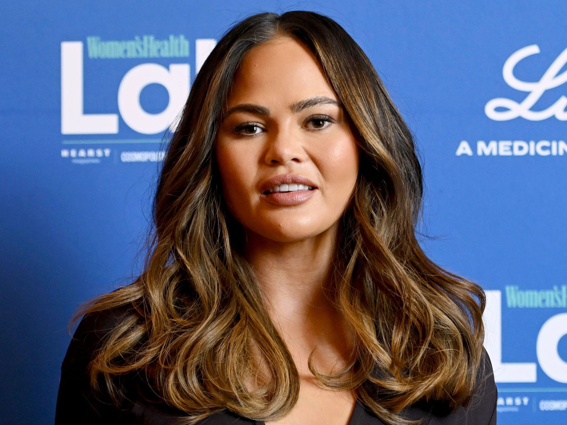 Chrissy Teigen goes live with a shocking bandaged face and
