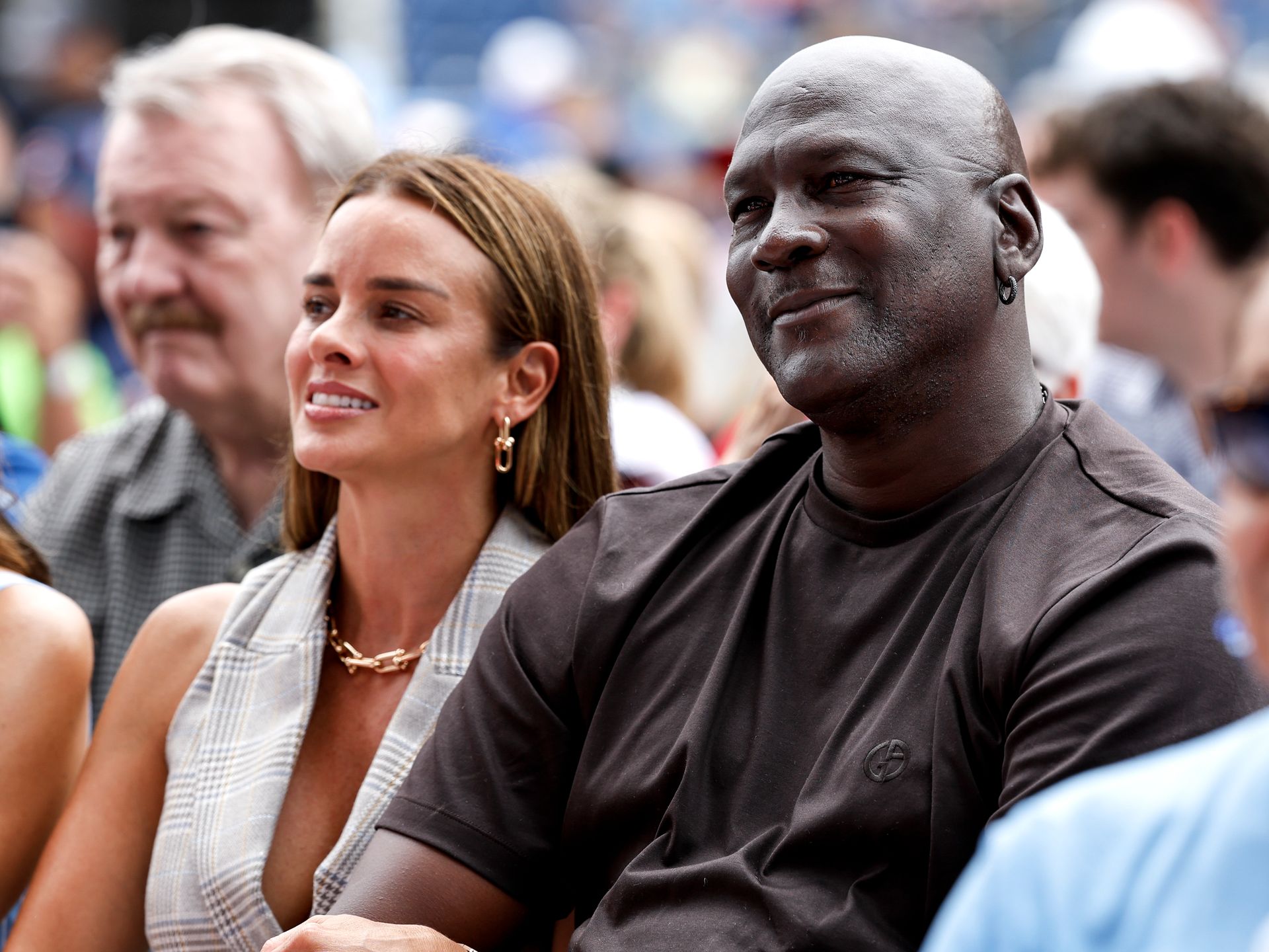 Michael Jordan and Yvette Prieto playfully dance while on vacation