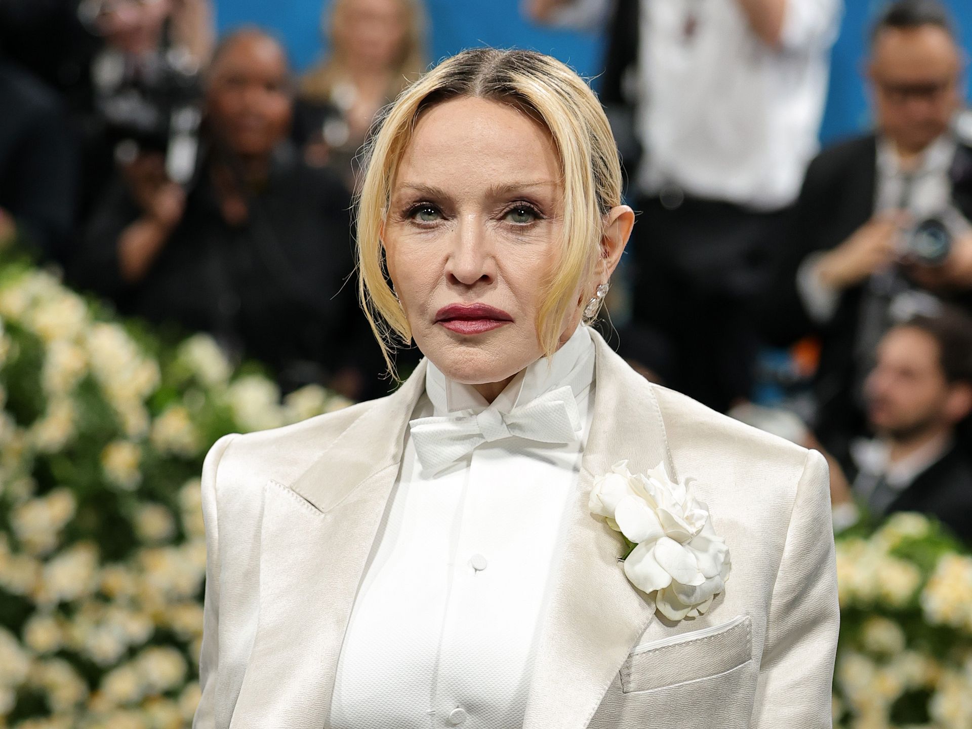 Madonna heats things up in bed with handsome co-stars in her bold