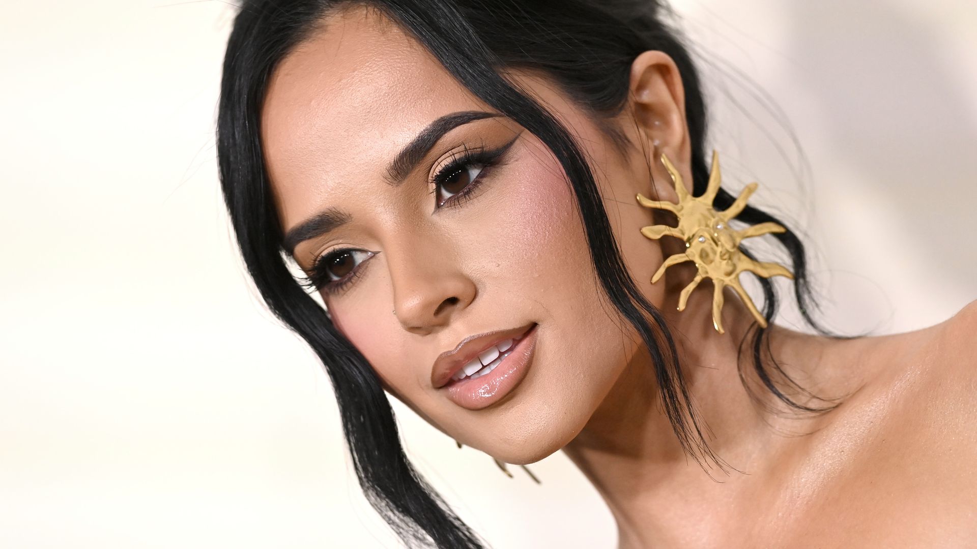 Becky G looks like a goddess in sultry gown and gold sandals