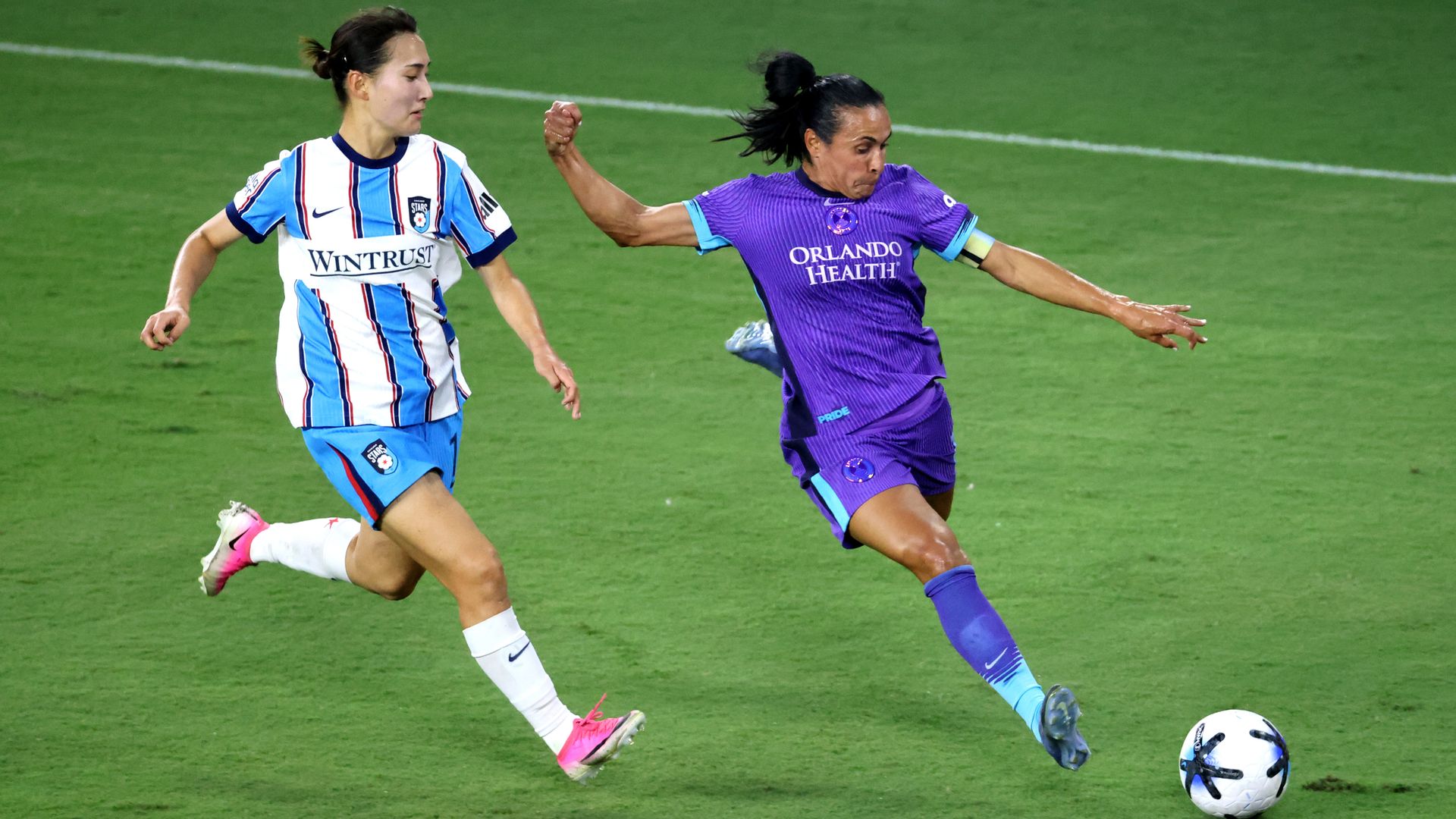 ORLANDO, FLORIDA - JULY 24: Marta #10 of Orlando Pride controls the ball whilst under pressure from Manaka Hayashi #16 of Chicago Stars FC during the NWSL match between Orlando Pride and Chicago Stars FC at Inter.Co Stadium on July 24, 2026 in Orlando, Florida. (Photo by Alex Menendez/NWSL via Getty Images)