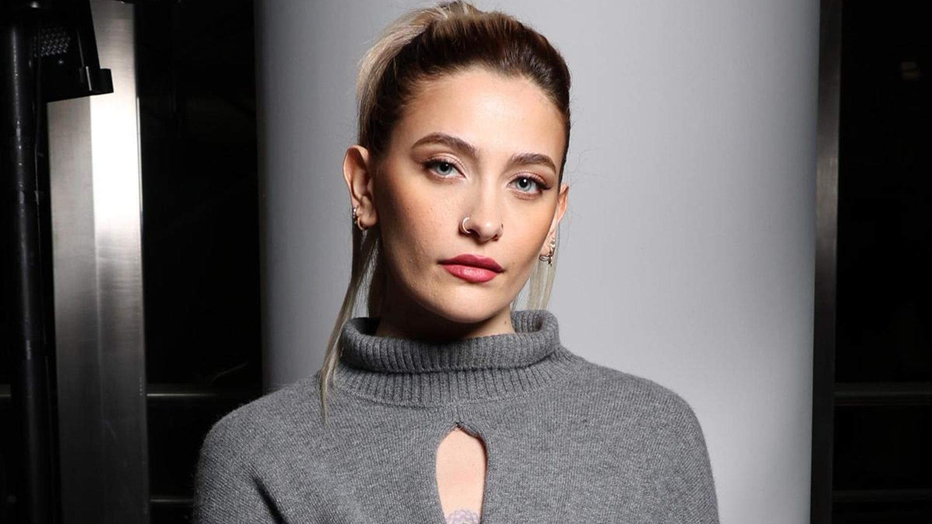 Paris Jackson debuts a new midriff tattoo during Paris Fashion Week