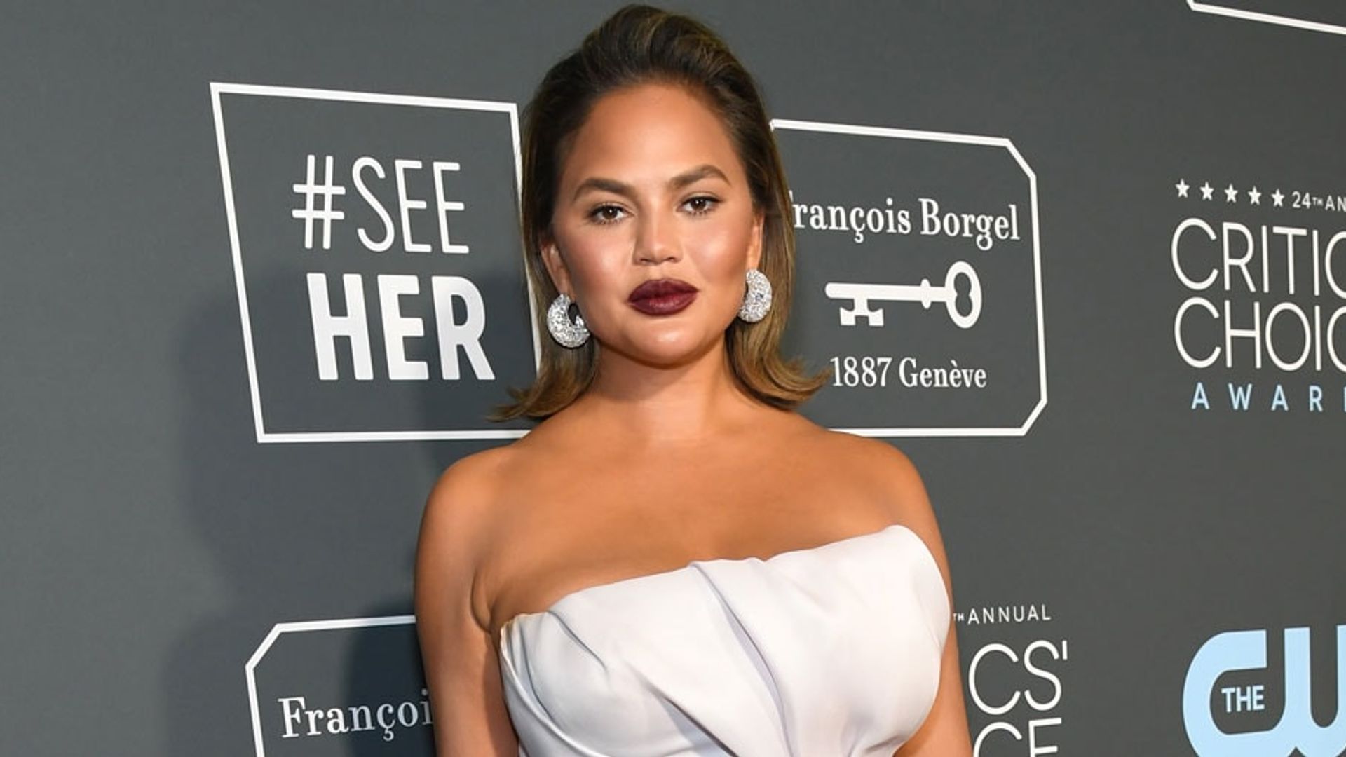 Chrissy Teigen flaunts one million dollars worth of jewelry during John Legend's birthday bash