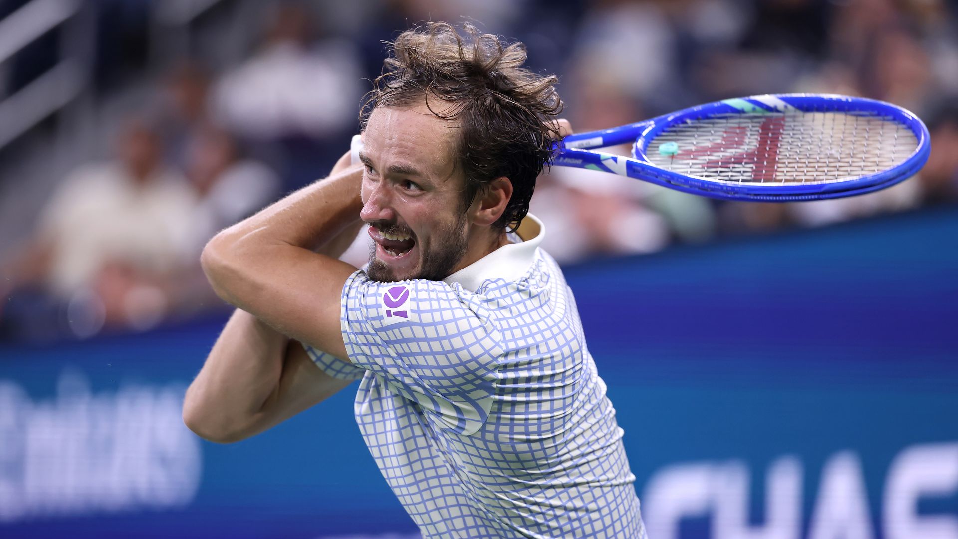 Daniil Medvedev returns a shot against Benjamin Bonzi of France during their Men's Singles First Round match on Day One of the 2025 US Open 