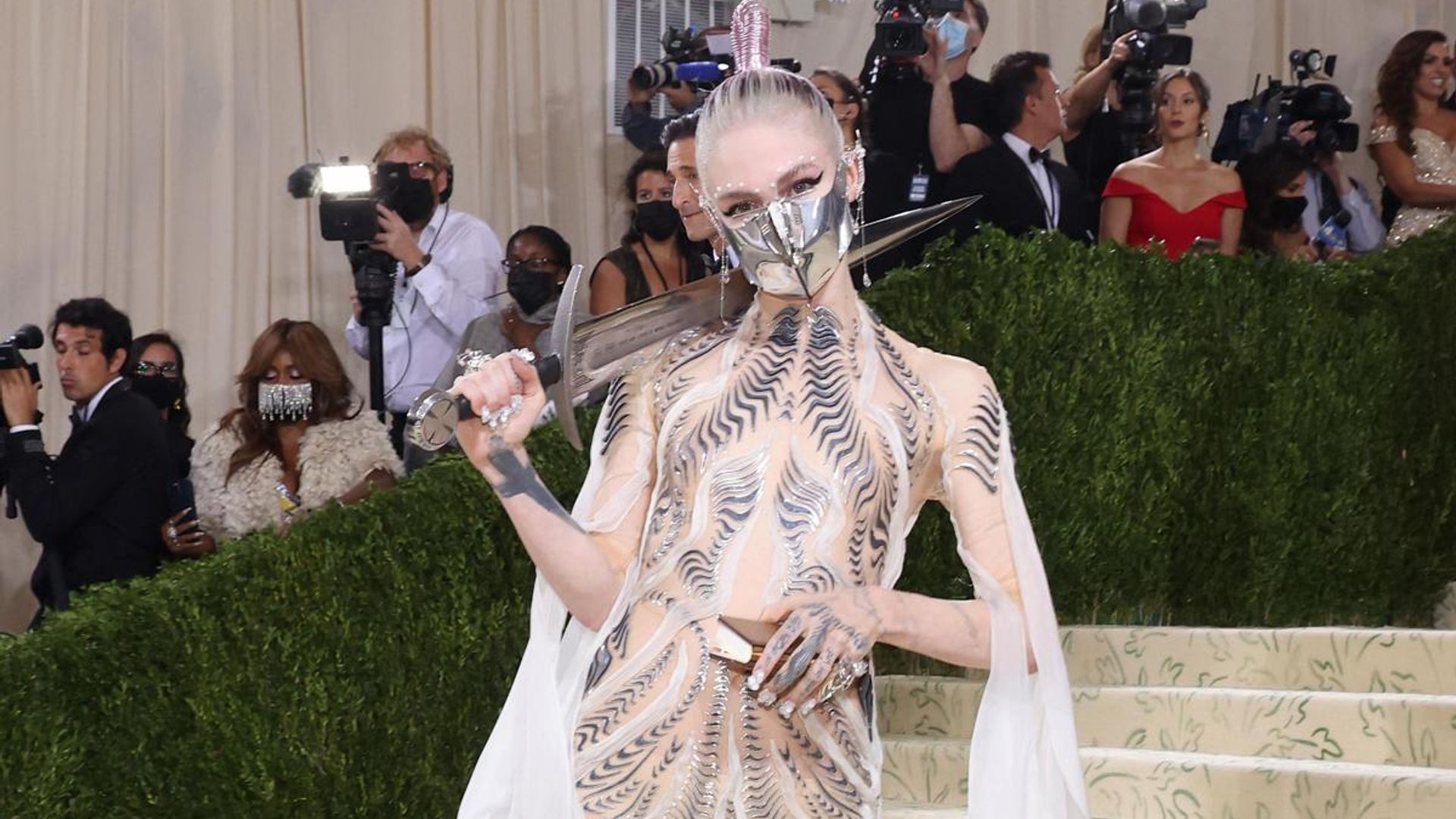 Grimes is auctioning off her Met Gala accessories to raise money for BIPOC families in Ukraine