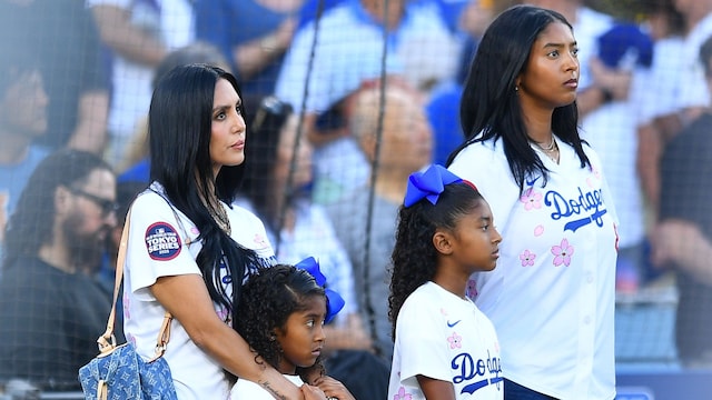 LOS ANGELES, CA - AUGUST 08: Vanessa Bryant,left with her children Capri, Bianka and Natalia look on during the national anthem on Kobe Bryant bobble head night prior to the MLB game between the Toronto Blue Jays and the Los Angeles Dodgers on August 8, 2025 at Dodger Stadium in Los Angeles, CA. (Photo by Brian Rothmuller/Icon Sportswire via Getty Images) 