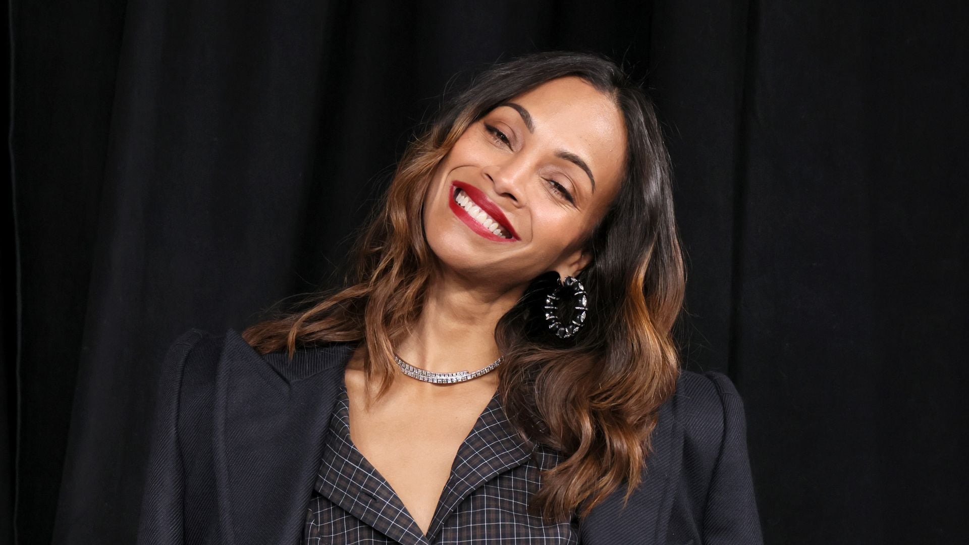 Zoe Saldaña enjoys game with husband and son: Which team was she cheering for?