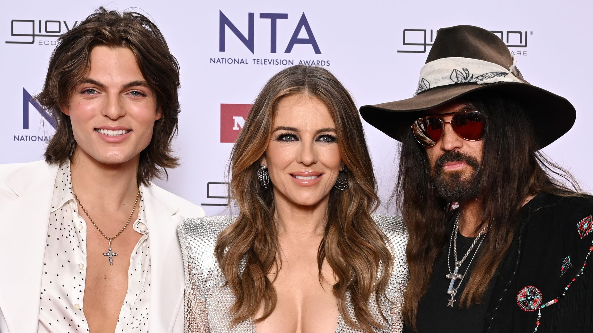 LONDON, ENGLAND - SEPTEMBER 10: (EXCLUSIVE COVERAGE) (L-R) Robert Rinder, Damian Hurley, Elizabeth Hurley and Billy Ray Cyrus attend the NTA's 2025 at The O2 Arena on September 10, 2025 in London, England. (Photo by Jeff Spicer/Getty Images for the NTA's)
