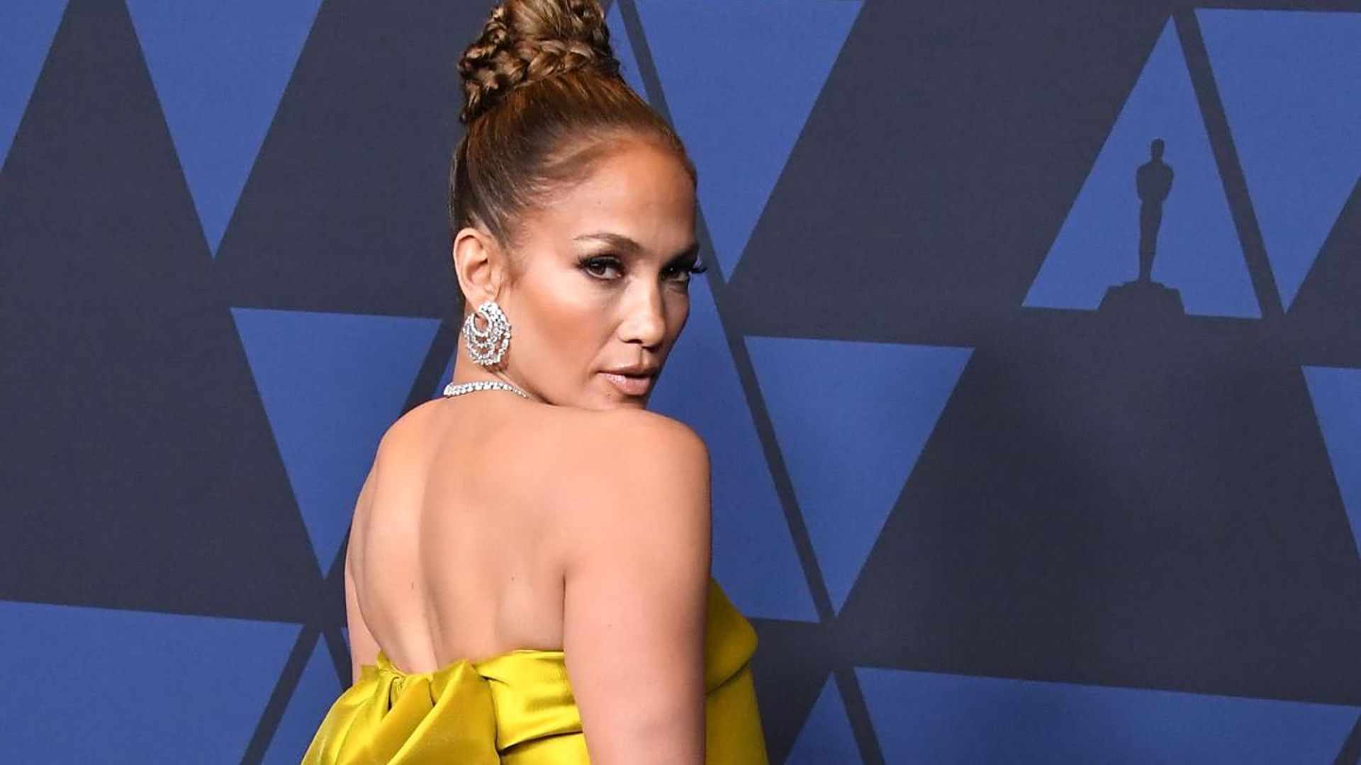 j lo yellow dress red carpet Jennifer Lopez's Yellow Dresses Over the Years: All the Looks [Photos]