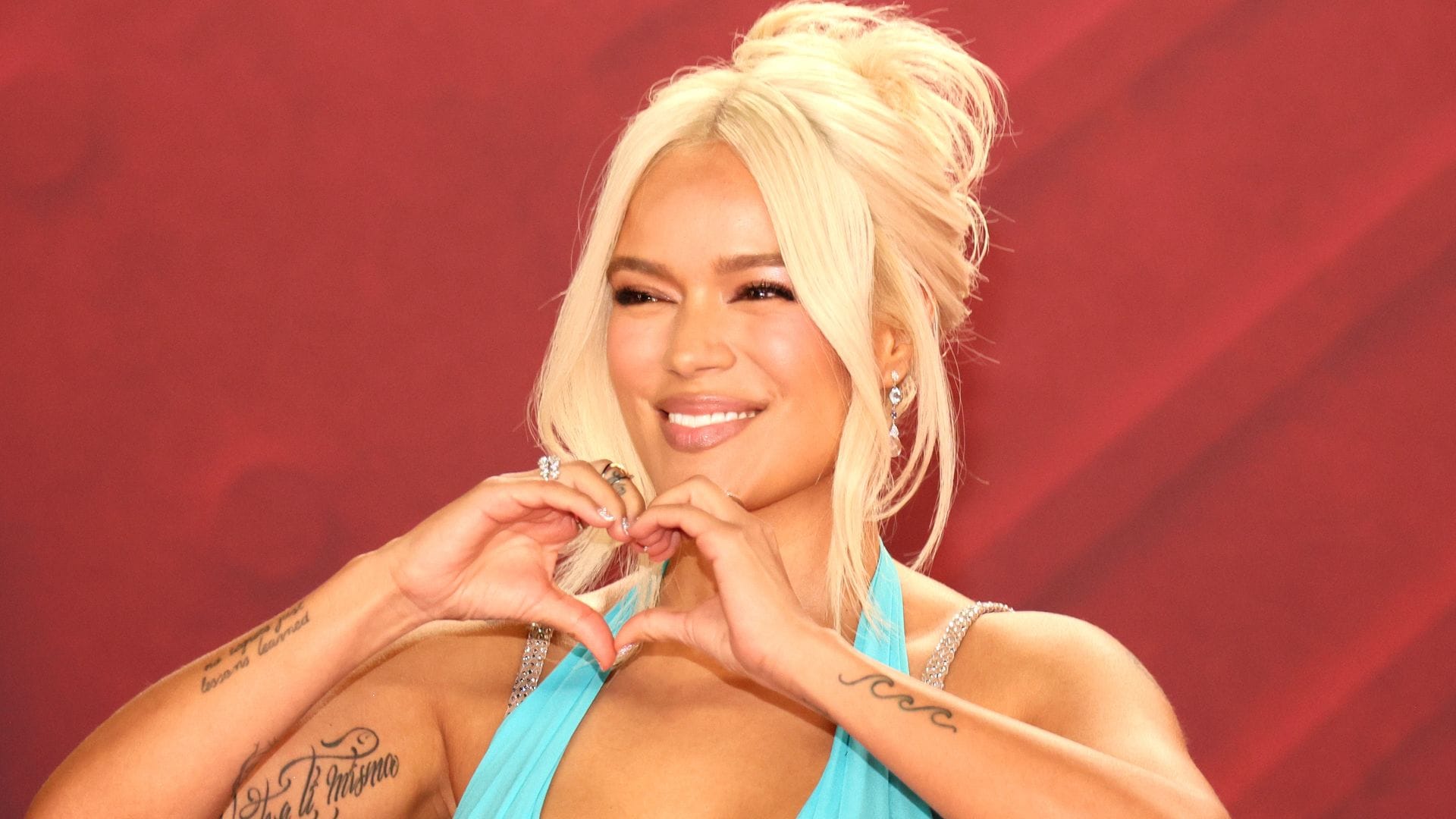 Karol G turns heads in vintage bikini once worn by 1970s vedette Rossy Mendoza