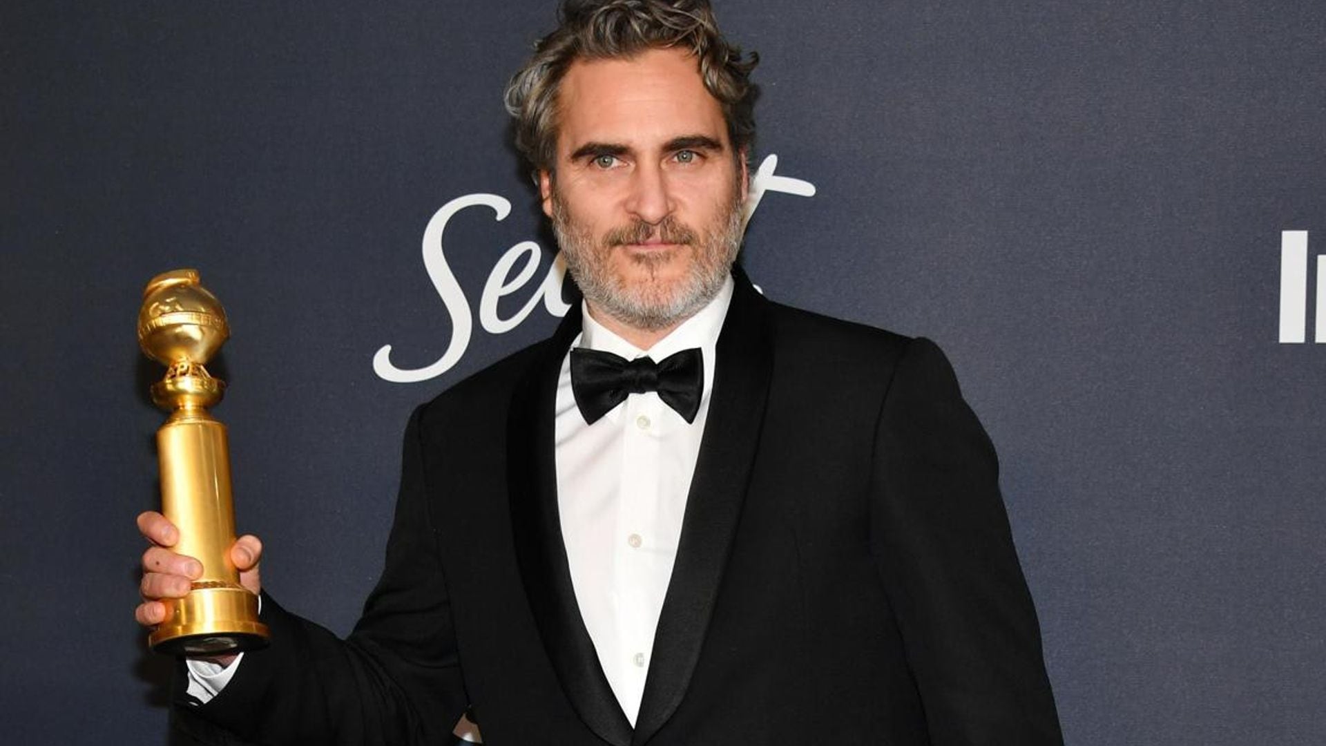 Joaquin Phoenix celebrates a win at the 2020 Golden Globes