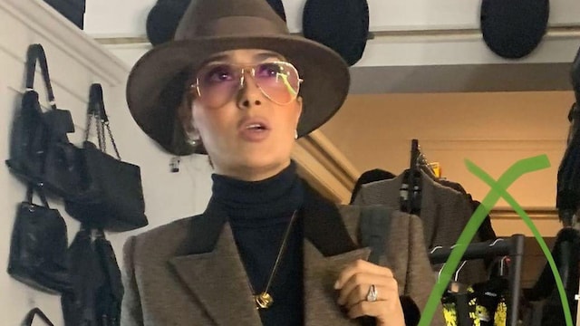 Salma Hayek wearing an all brown outfit
