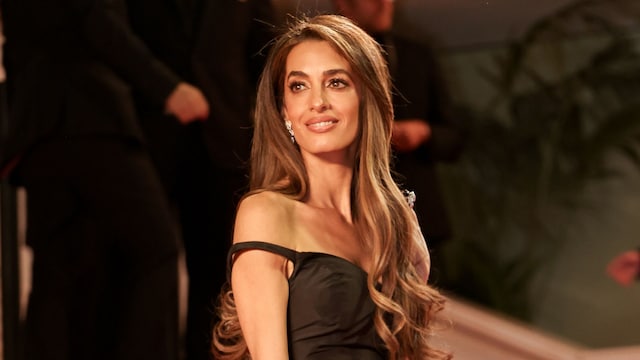 Amal Clooney is a goddess in white and silver gown in London