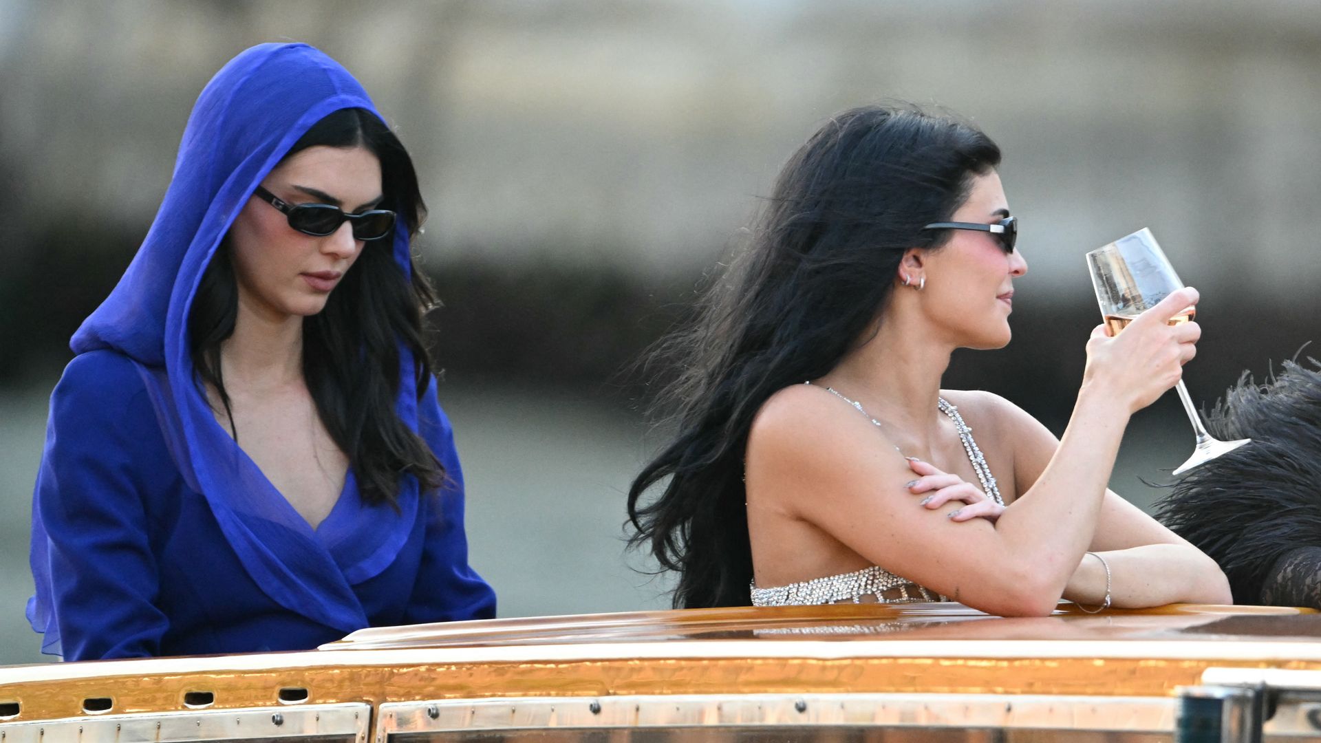 US model Kendall Jenner (L), US television personality Kris Jenner (R) and US Kylie Jenner