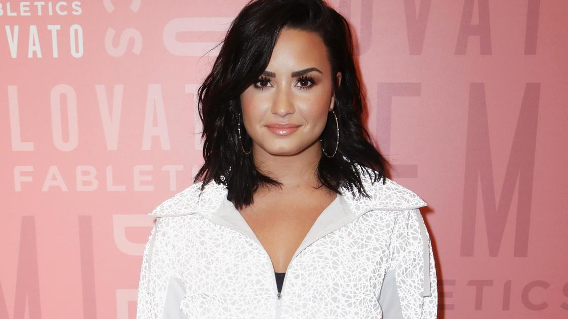 Demi Lovato introduces new boyfriend Austin Wilson with shirtless kiss photo