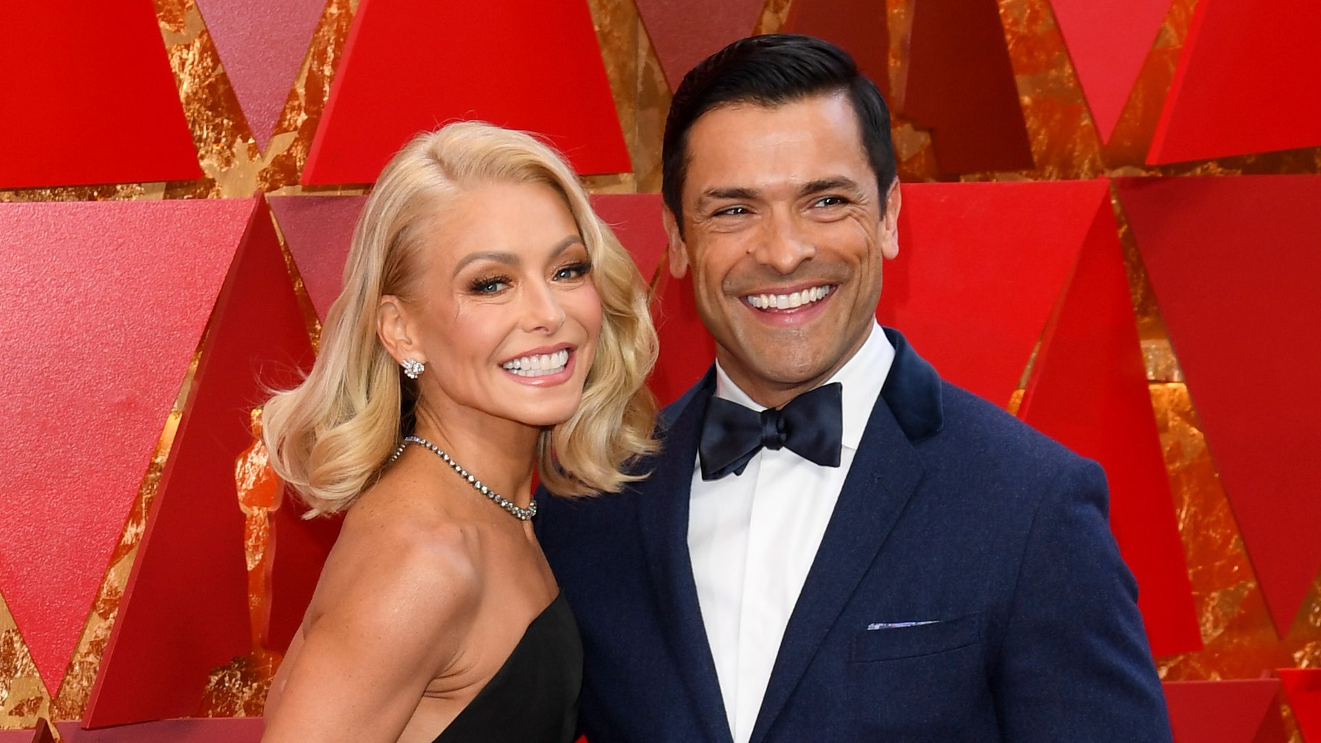 Kelly Ripa and Mark Consuelos (Photo by Andrew H Walker/WWD/Penske Media via Getty Images)