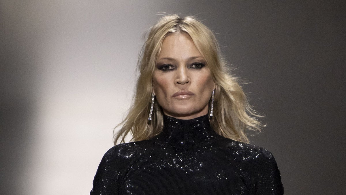 Kate Moss steals the spotlight with her chiselled cheekbones at