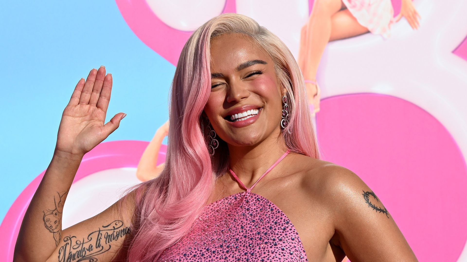 Karol G reveals why she tattooed her own face on her arm
