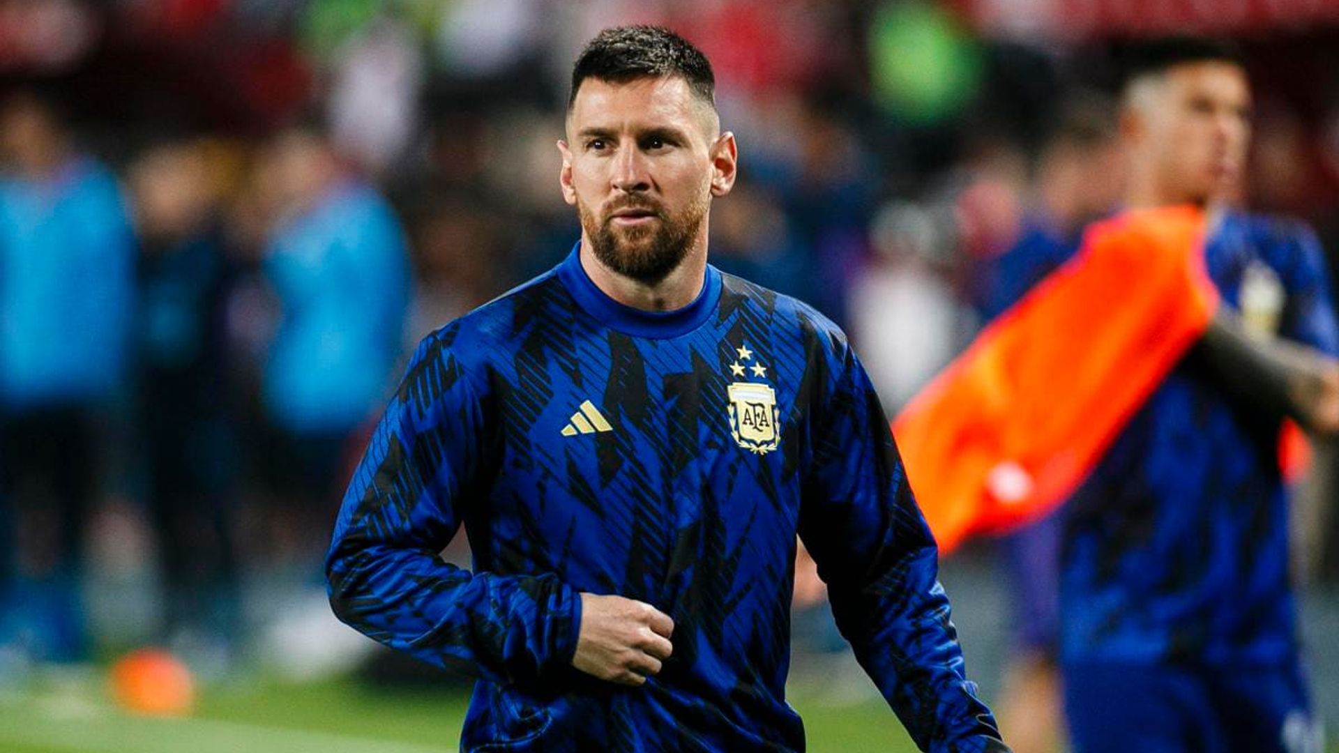 Lionel Messi is swarmed by fans as he tries to watch his son’s soccer match