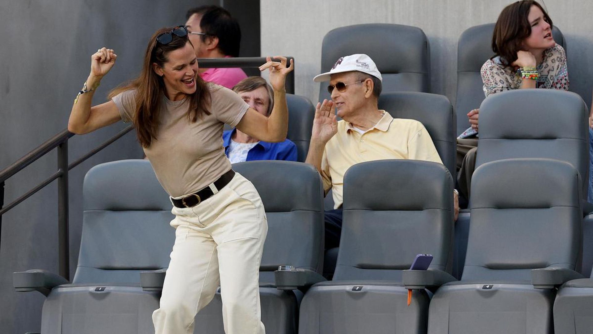 Jennifer Garner dances at the Angel City FC soccer game with Seraphina Affleck nearby