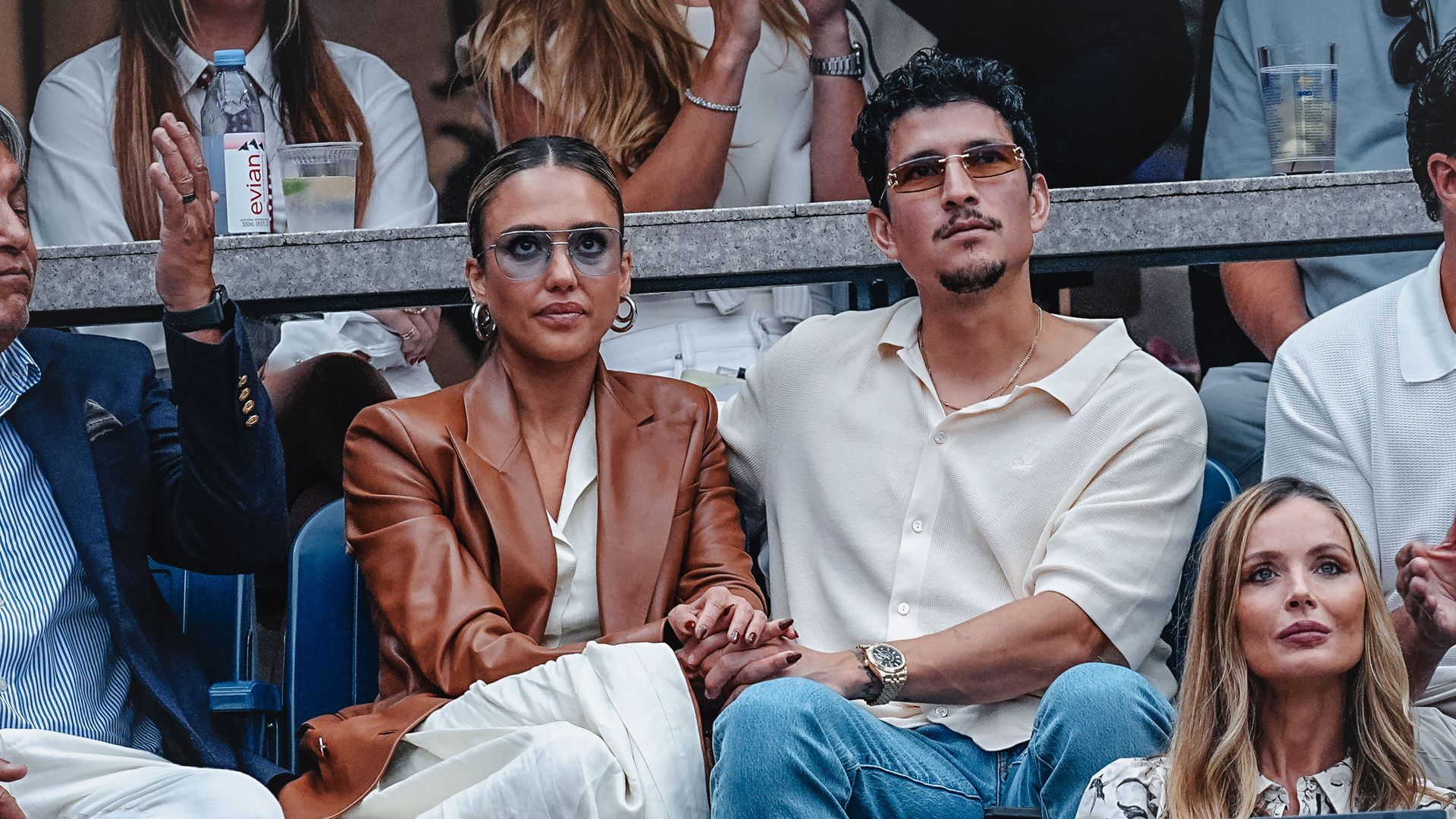 Jessica Alba and Danny Ramirez can't get their hands off each other at the U.S. Open