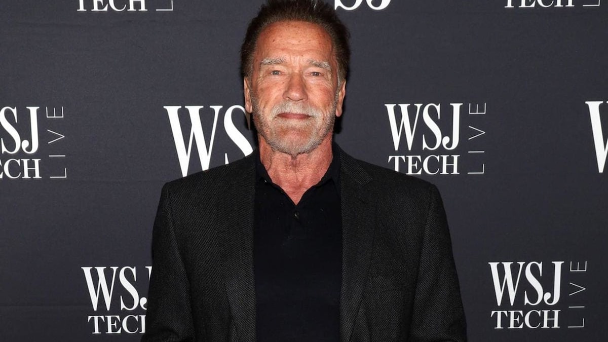 Arnold Schwarzenegger’s bodyguard is so tall he goes viral