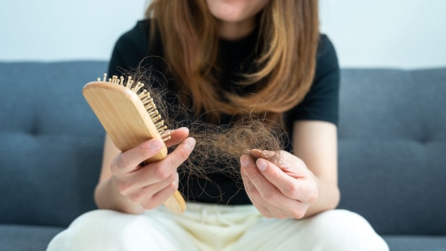 Hair loss is caused by family history, hormonal changes, and unhealthy aging.