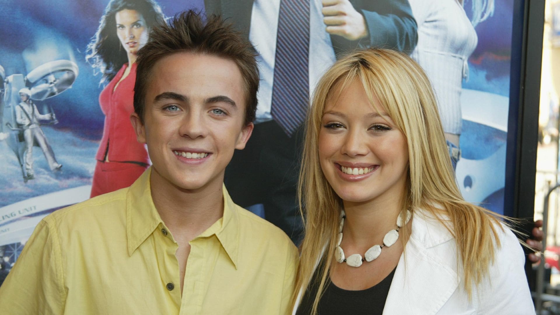 Actors Frankie Muniz and Hilary Duff arrive for the premiere of the film "Agent Cody Banks" at the Mann Village Theatre on March 8, 2003, Westwood, California. (Photo Frazer by Harrison/Getty Images)