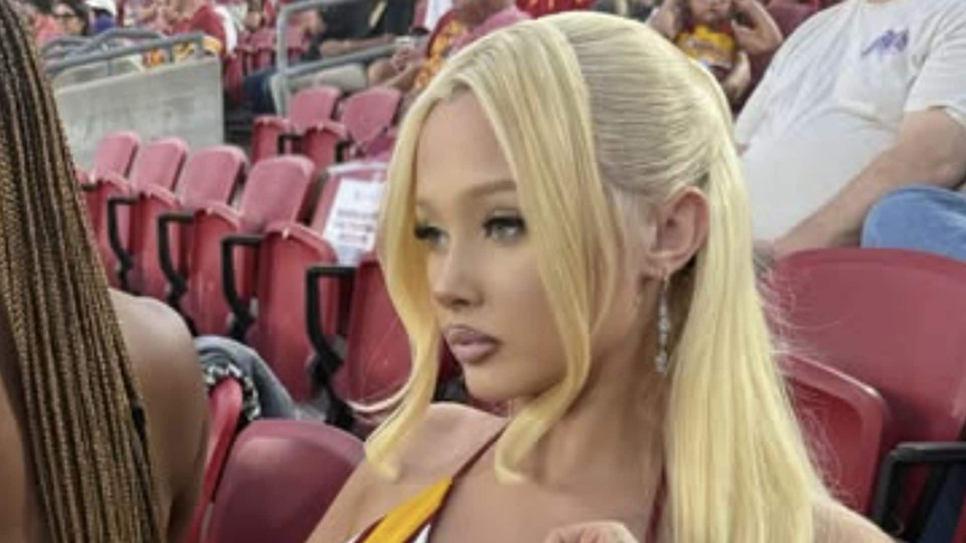 Alabama Barker turns heads with sultry football game photos