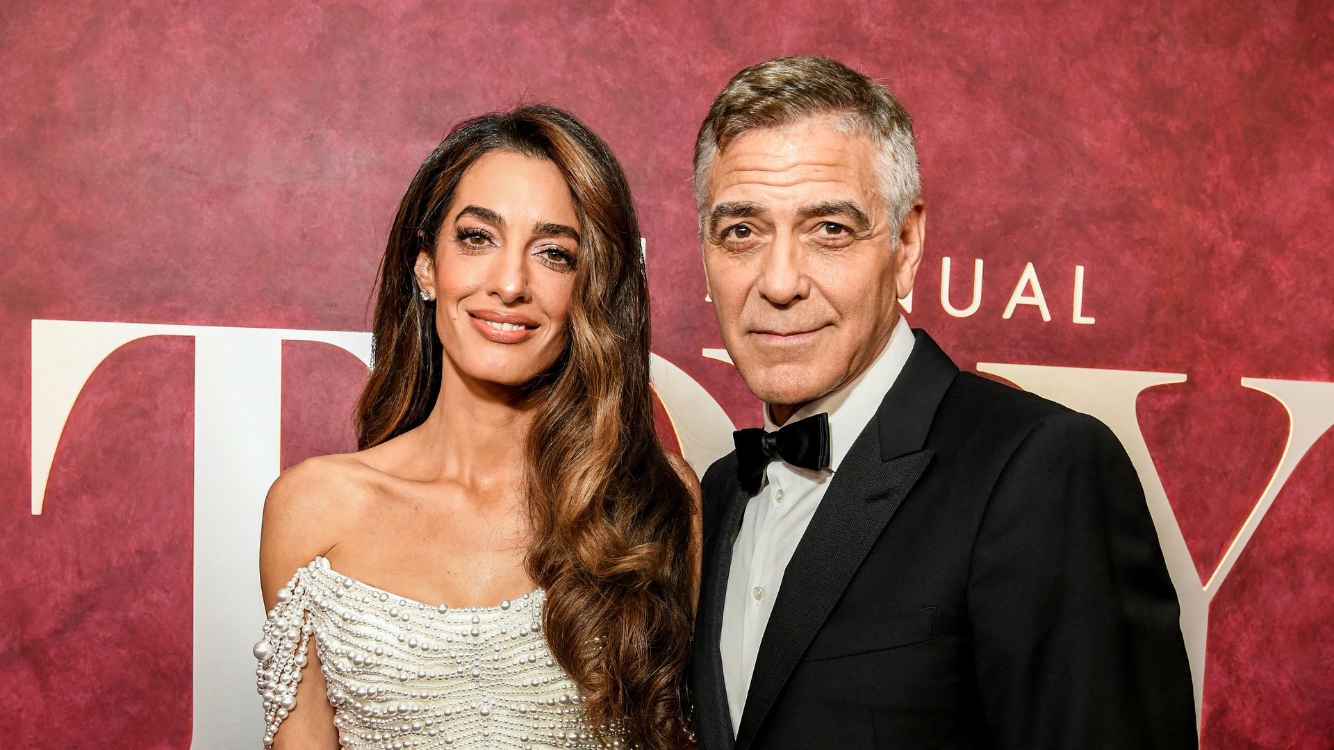 Amal Clooney wows in velvet minidress and sky-high heels as she celebrates 11 years with George Clooney