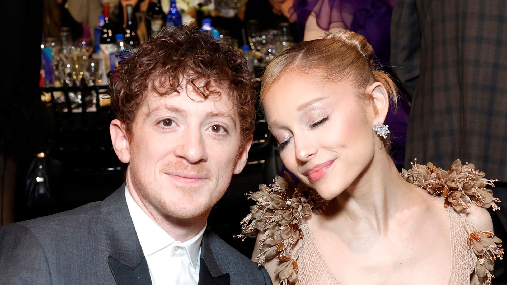 SANTA MONICA, CALIFORNIA - FEBRUARY 07: (L-R) Ethan Slater, Ariana Grande and a guest attend FIJI Water at The 30th Critics Choice Awards at Barker Hangar on February 07, 2025 in Santa Monica, California. (Photo by Stefanie Keenan/Getty Images for FIJI Water) 