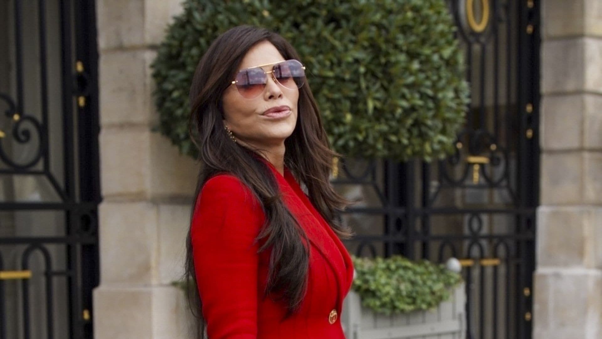 

Jeff Bezos and his wife Lauren Sánchez Bezos were spotted arriving hand in hand at the Schiaparelli Spring/Summer 2026 Haute Couture show during Paris Fashion Week, sharing a sweet moment of PDA as they made their entrance at the Petit Palais. Lauren turned heads in a striking red ensemble, styled with matching pointed-toe stiletto heels, oversized sunglasses, and her quirky Schiaparelli mini bag featuring a sculpted face design. Earlier in the day, Sánchez Bezos was also seen out for lunch at The Ritz in Paris alongside Vogue icon Anna Wintour.