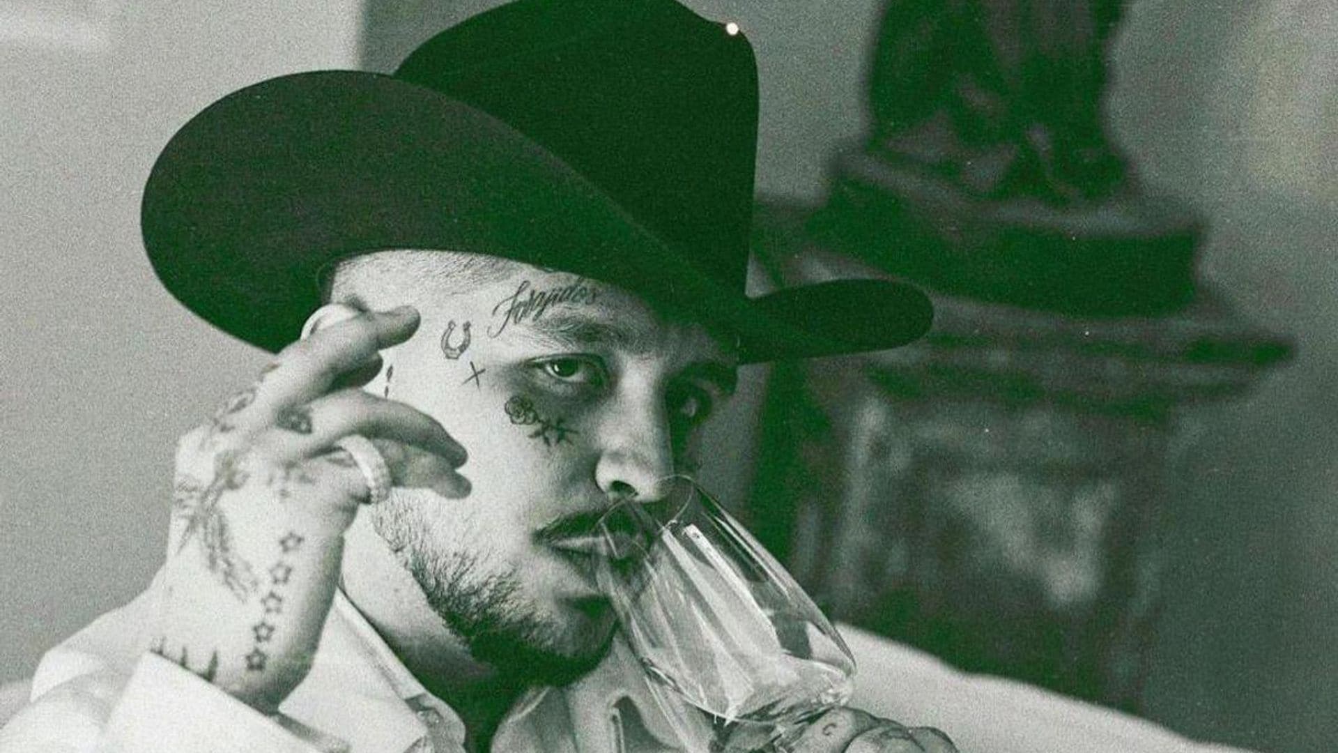 Is Christian Nodal getting his face tattoos removed?