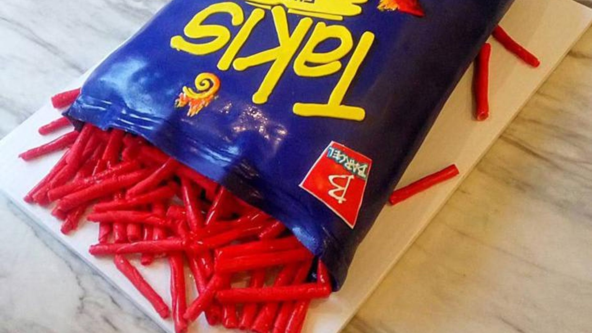 Takis Pinata Takis, Latinx childhood snack, are given a chef level twist
