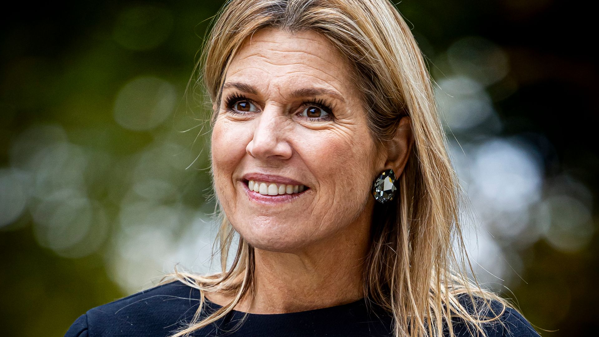 Queen Máxima of the Netherlands revives her fringe tweed dress and stunning triple-pearl earrings