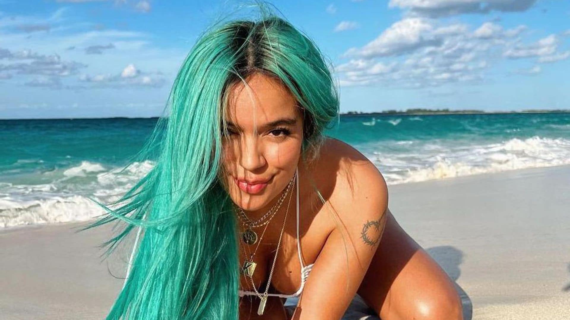Karol G forgot her bikini! Colombian superstar shares suggestive pictures of herself submerged in the ocean