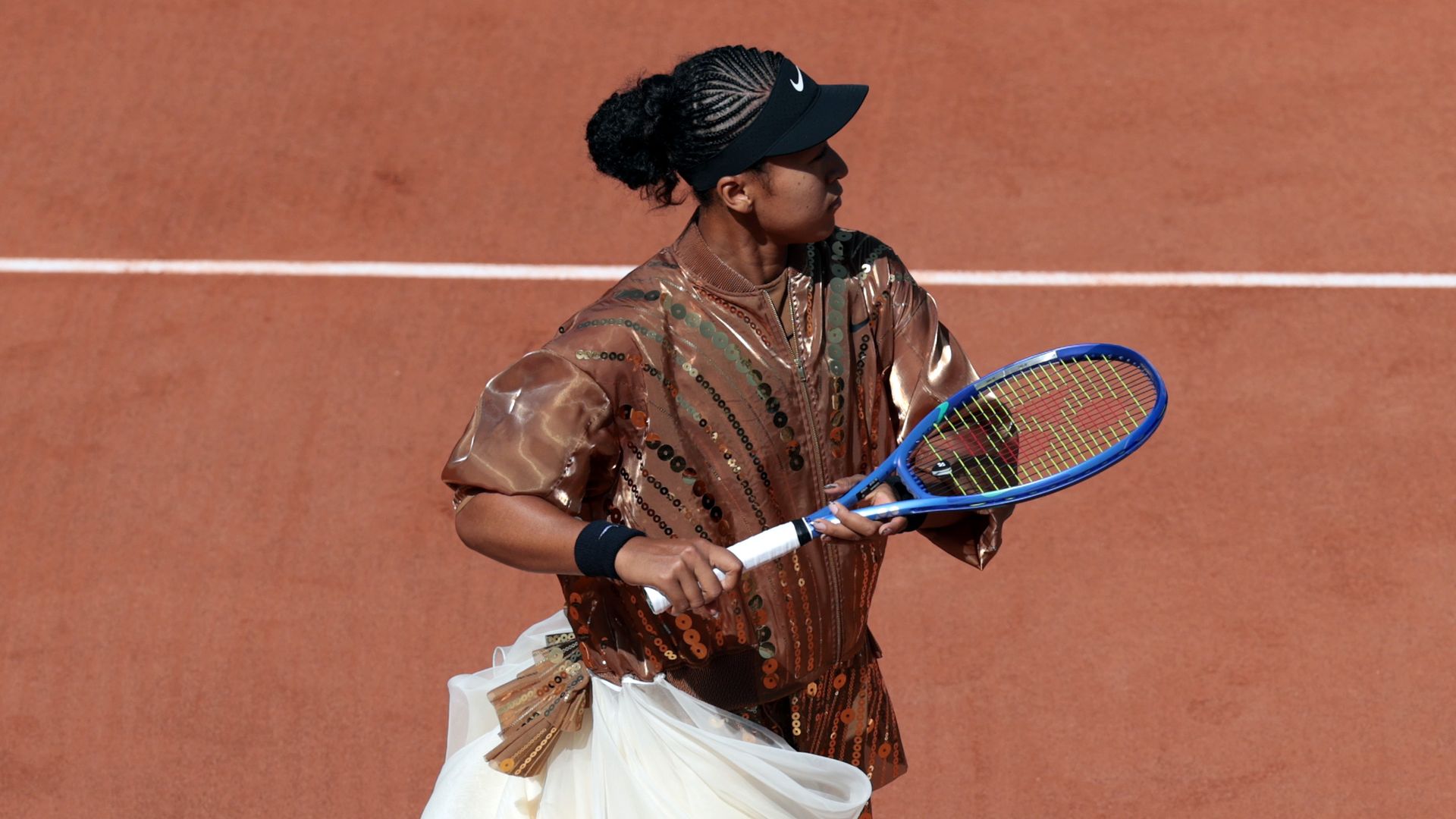 https://www.hola.com/us/horizon/landscape/21e2fffaec34-paris-france-naomi-osaka-of-japan-is-seen-wearing-a-dress-collaberated-wit-nike.jpg?im=Resize=(1200)